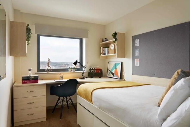 Desk lamp bed and pinboard student room at Discovery Heights in Plymouth Student Accommodation