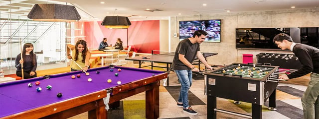 Pool table foosball and ping pong table living room at Student One Adelaide Street in Brisbane Student Accommodation