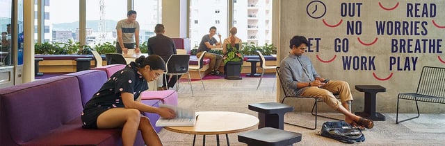 Lounge seating with students reading and working communal area at Student One Wharf Street in Brisbane Student Accommodation