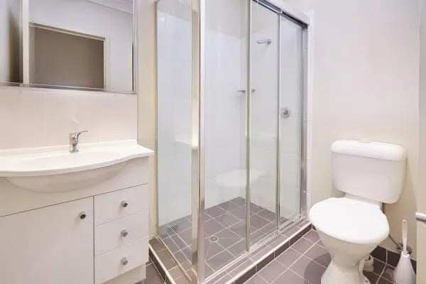 Sink toilet shower and cabinets bathroom at Genesis 1 in Brisbane Student Accommodation