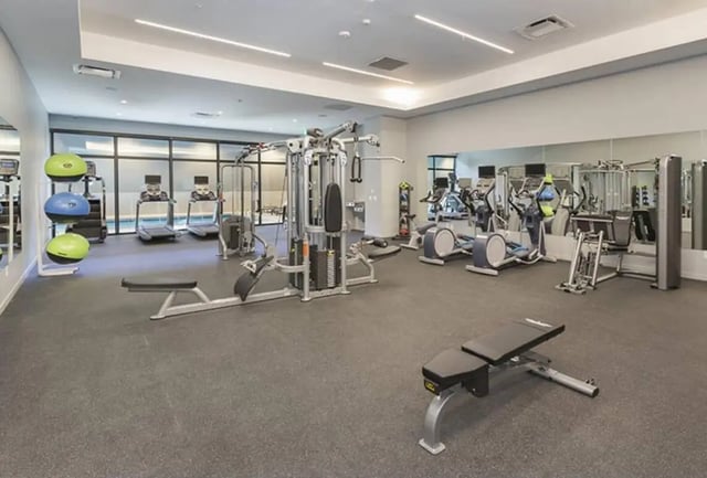 Fitness equipment exercise machines weight benches gym at 24 Fifty at University Park in Denver Student Accommodation