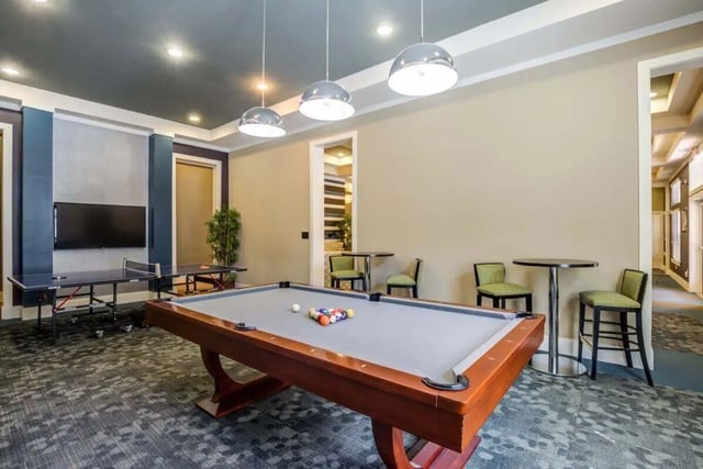 Pool table ping pong tables television game room at The Union Charlotte in Charlotte Student Accommodation