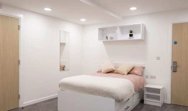 Bed with drawers mirror shelf bedside table bedroom at The Cavendish in Winchester Student Accommodation