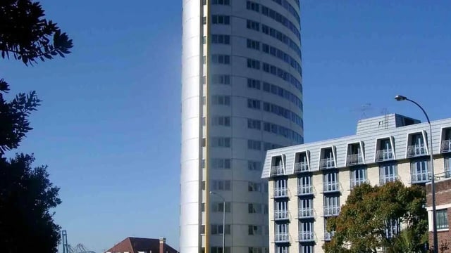 Tall building with many windows exterior at Student Living Auckland in Auckland Student Accommodation