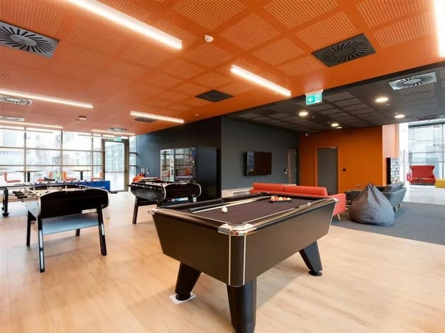 Pool table foosball tables vending machine lounge area at Brickworks in Dublin Student Accommodation