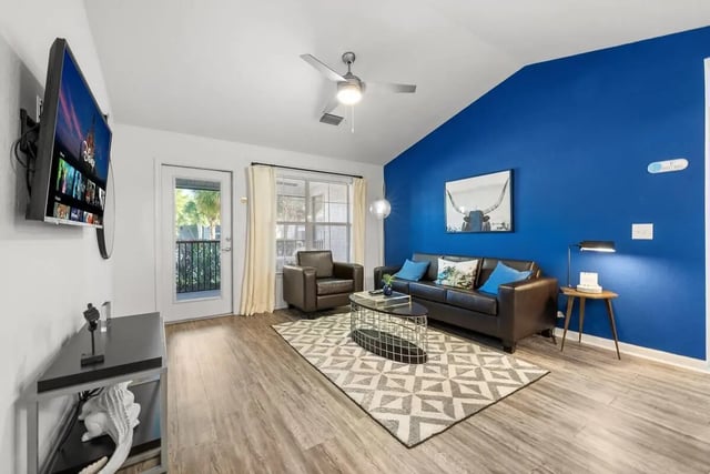 Sofa chair coffee table rug living room at Cabana Beach Gainesville in Gainesville Student Accommodation