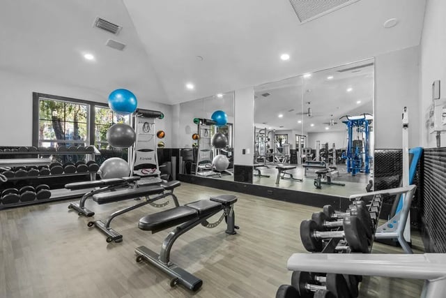 Dumbbells benches exercise balls fitness equipment gym at Cabana Beach Gainesville in Gainesville Student Accommodation