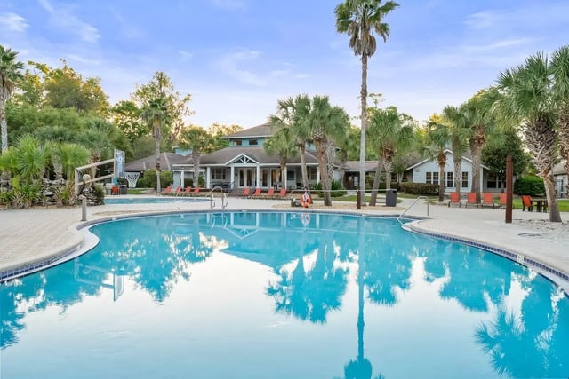 Resort style pool and clubhouse exterior at Cabana Beach Gainesville in Gainesville Student Accommodation