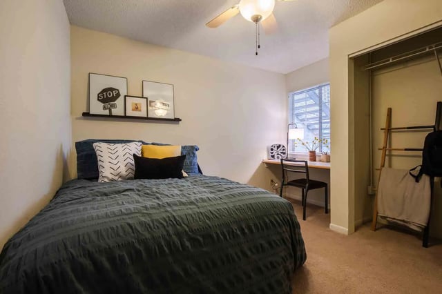 Bed desk and closet visible bedroom at Alight Blacksburg in Blacksburg Student Accommodation