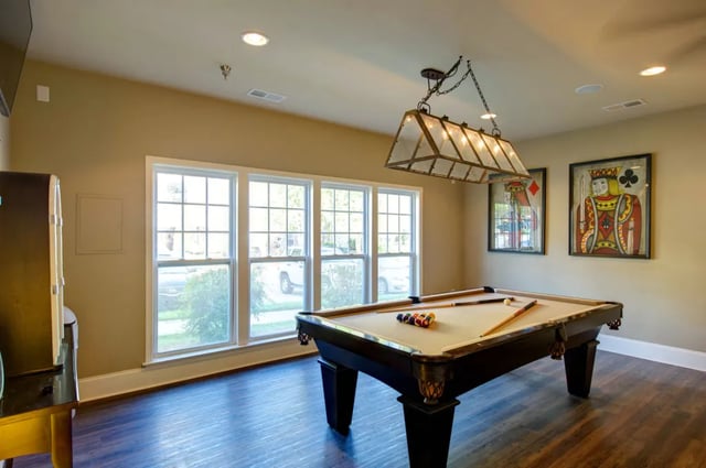 Pool table with balls and cues Game Room at The Verge at Asheville in Asheville Student Accommodation