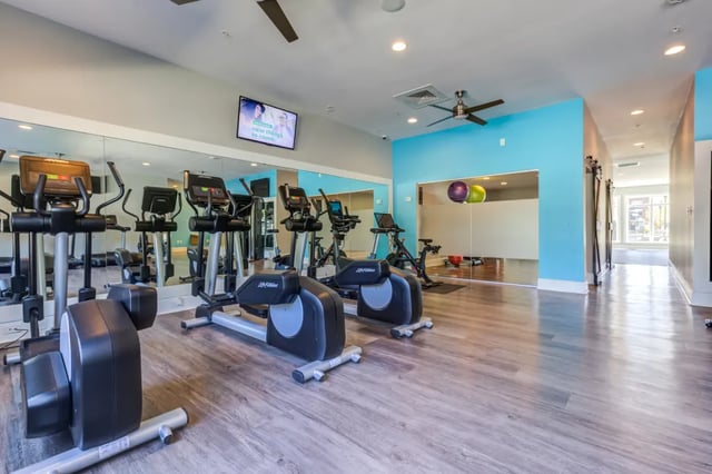 Elliptical machines treadmills stationary bike gym area at The Reserve at Greensboro in Greensboro Student Accommodation