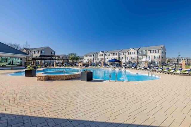 Pool and lounge chairs exterior at Copper Beech Townhomes - San Marcos in San Marcos Student Accommodation