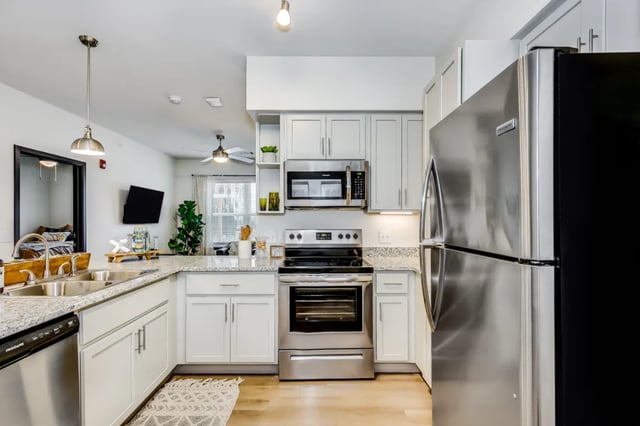 Stainless steel appliances countertops cabinets kitchen at Altitude at Wichita in Wichita Student Accommodation