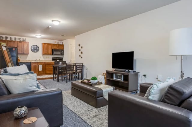 Sofa dining set kitchen and TV living room at The Reserve Mount Pleasant in Mount Pleasant Student Accommodation