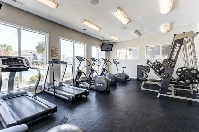 Treadmills ellipticals weight machine fitness center at Cambridge @ Southern - The Palms in Statesboro Student Accommodation