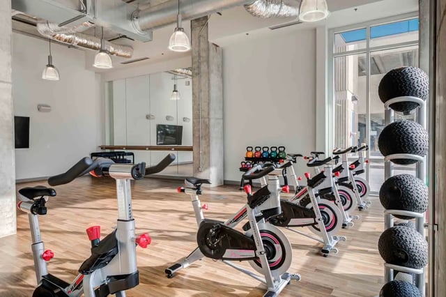 Spin bikes kettlebells medicine balls gym at LUX on Capitol in Indianapolis Student Accommodation