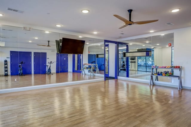 Spin bikes weights and mirrored walls gym at Ion Baton Rouge in Baton Rouge Student Accommodation