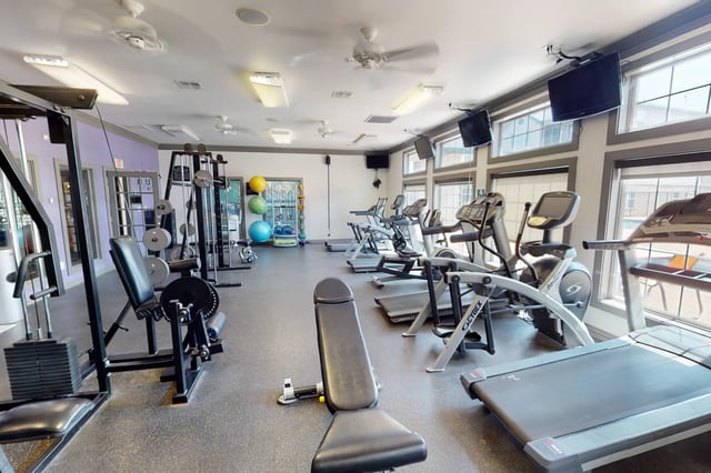 Weight machines treadmills and elliptical machines gym at The Quarters at Lincoln in Lincoln Student Accommodation