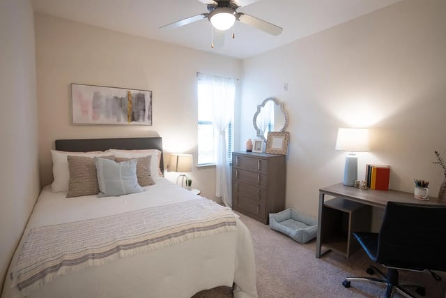 Bed desk and dresser bedroom at The Legacy Baton Rouge in Baton Rouge Student Accommodation