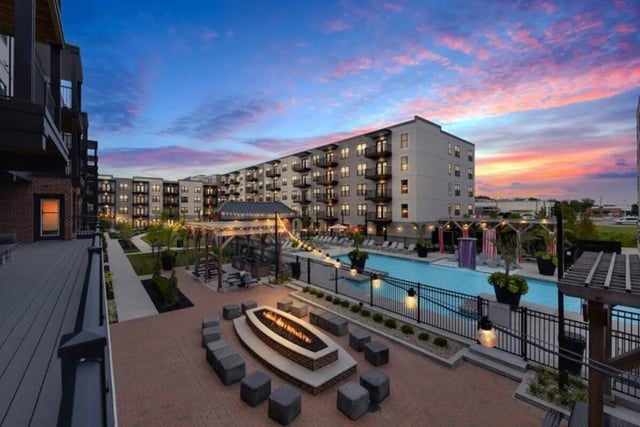 Apartment buildings pool fire pit and seating outdoor living area at T-H-E Griff in Columbus Student Accommodation