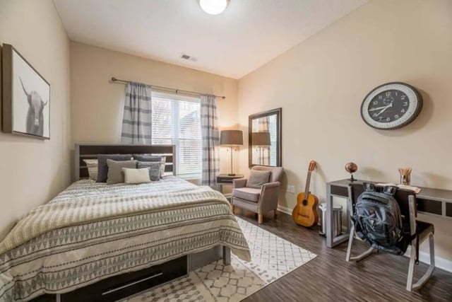 Bed desk chair guitar clock bedroom study area at T-H-E Griff in Columbus Student Accommodation