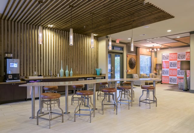 Bar with stools coffee maker sink communal area at The Retreat at Corvallis in Corvallis Student Accommodation
