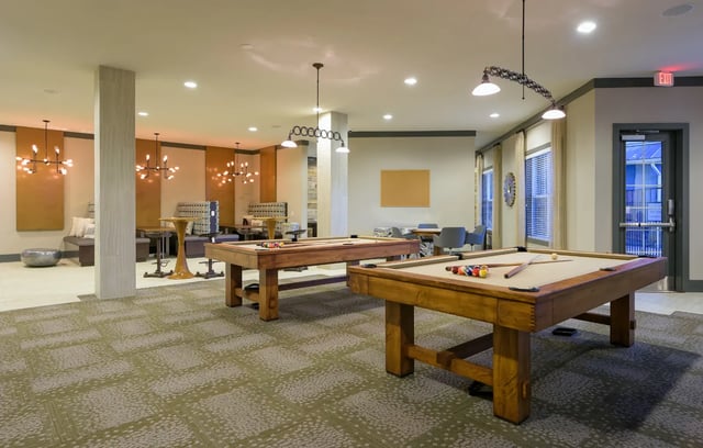 Pool tables with balls and cues common area at The Retreat at Corvallis in Corvallis Student Accommodation