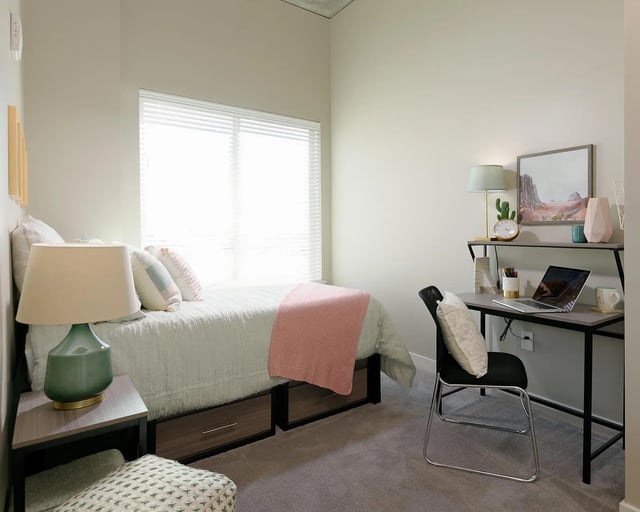 Bed desk chair and lamp bedroom. at The Mark at Tucson in Tucson Student Accommodation