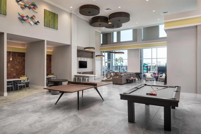 Pool table ping pong table lounge seating living room at The Mark at Tucson in Tucson Student Accommodation