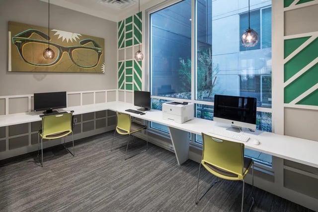 Computers printers chairs and artwork study area at The Mark at Tucson in Tucson Student Accommodation