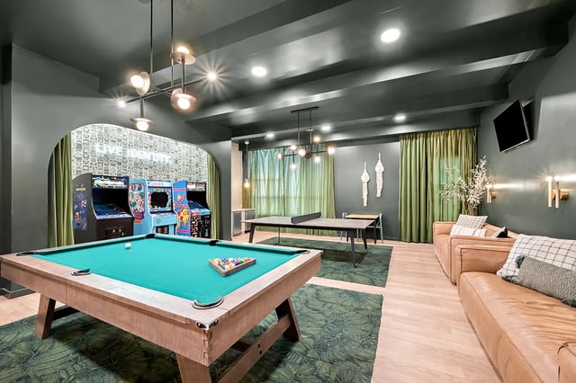 Billiard table arcade games ping pong table living room at Identity Davis Apartments in Davis Student Accommodation
