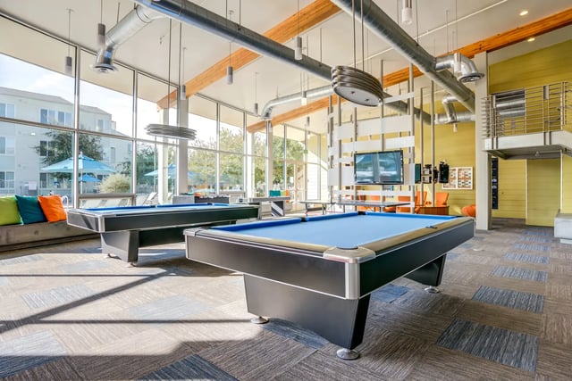 Pool tables and lounge area communal space at SOL at West Village in Davis Student Accommodation