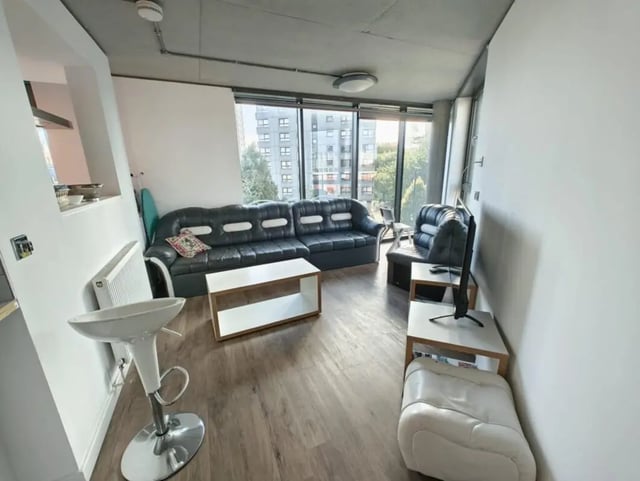 Sofa coffee table TV unit bar stool living room at London court in Sheffield Student Accommodation