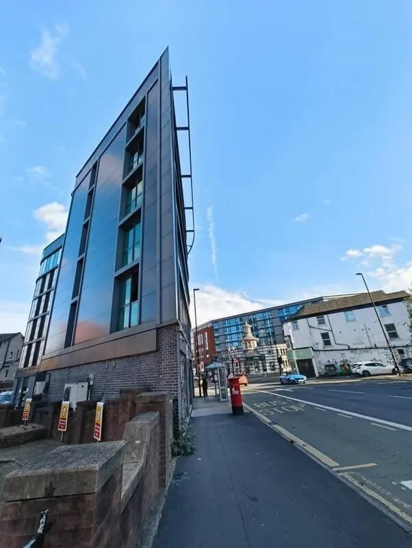 Modern building with glass facade exterior at London court in Sheffield Student Accommodation