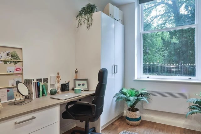 Desk chair laptop and plants study area at 140 New Walk Leicester in Leicester Student Accommodation