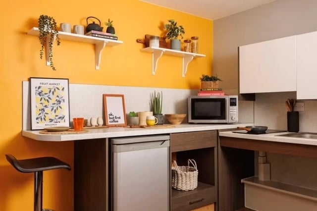 Bar stool microwave and fridge kitchen area at Sugarhouse in Edinburgh Student Accommodation
