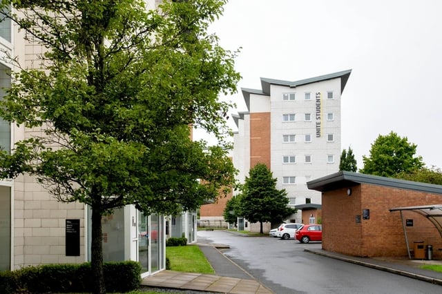 Student accommodation buildings with trees and cars Exterior at Clodien House in Cardiff Student Accommodation