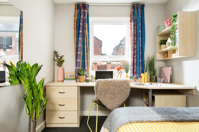 Desk with plants and laptop study area at Raglan House in Coventry Student Accommodation