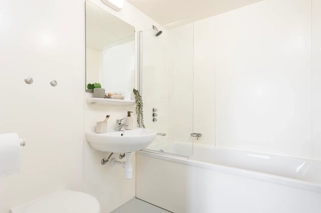 Sink mirror toilet bathtub and shower bathroom at Chalmers Street in Edinburgh Student Accommodation
