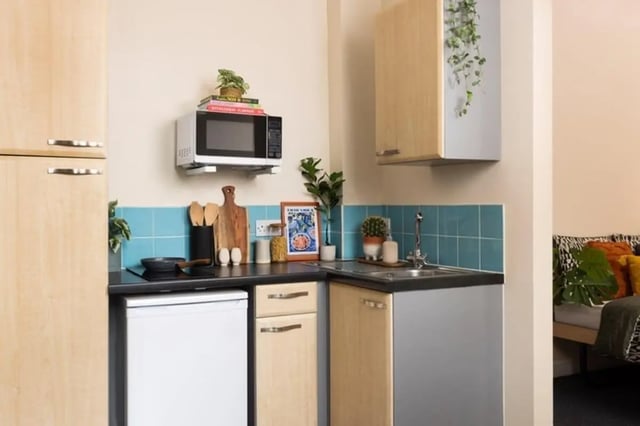 Microwave fridge sink cabinets and cooking area kitchen at Lennon Studios in Liverpool Student Accommodation