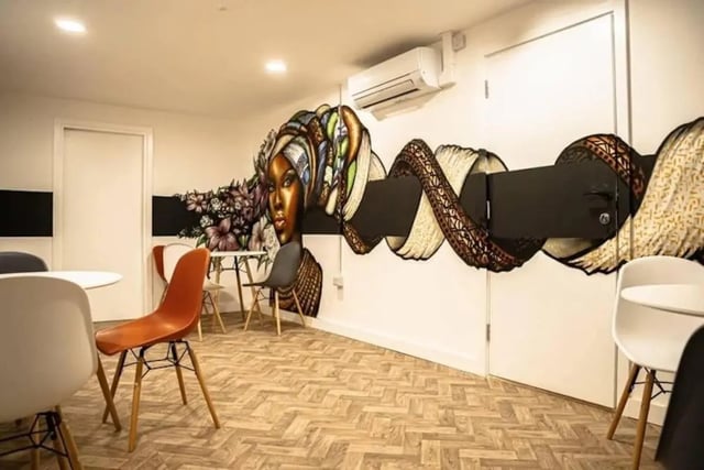 Mural artwork tables chairs study area at Bridge Street Studios in Birmingham Student Accommodation