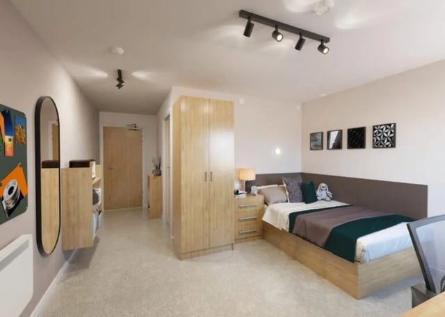 Bed wardrobe mirror shelving unit bedroom at Jennens Court in Birmingham Student Accommodation