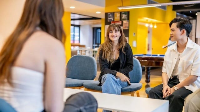 Students talking by pool table common area at UniLodge Victoria University in Melbourne Student Accommodation