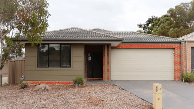 House exterior with garage and front door exterior at La Trobe University Regional Housing - Ballarat in Melbourne Student Accommodation