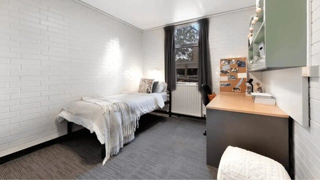 Bed desk and shelf student room at La Trobe University - Glenn College in Melbourne Student Accommodation