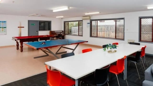 Billiard and ping pong tables with communal table area lounge at UniLodge @ UC - Campus West & Guginya in Canberra Student Accommodation