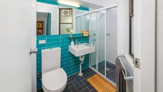 Toilet sink shower and towels bathroom at UniLodge @ UC - Campus West & Guginya in Canberra Student Accommodation
