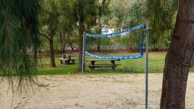 Volleyball net picnic table bench outdoor area at UniLodge @ UC - Campus West & Guginya in Canberra Student Accommodation
