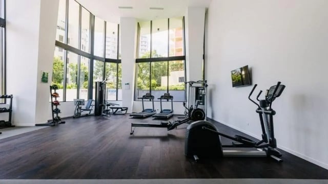 Gym with treadmills rowing machine elliptical Image Type Gym at Realm Kangaroo Point in Brisbane Student Accommodation