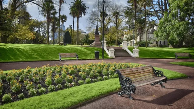 Park with benches and flower beds exterior at Wellesley Apartments in Auckland Student Accommodation
